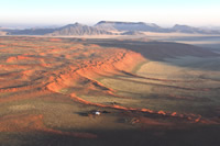 Views of mountains, dunes and the fog.