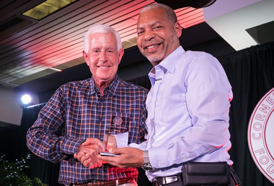 Lance Collins, the Joseph Silbert Dean of Engineering, right, awards David Duffield with the Cornell Engineering Distinguished Alumni Award – the college's highest alumni honor. 