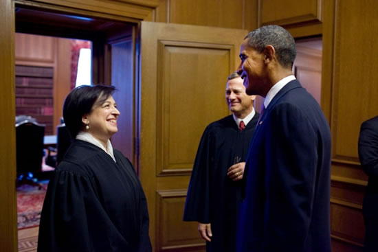 President Barack Obama talks with Justice Elena Kagan and Chief Justice John Roberts before Kagan’s Investiture Ceremony at the Supreme Court in 2010 
